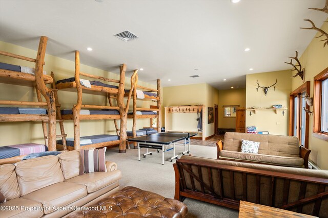 bedroom with carpet, visible vents, and recessed lighting