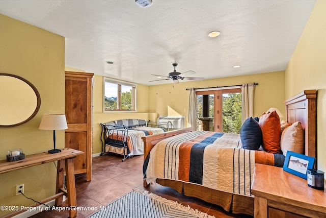 tiled bedroom with ceiling fan and access to exterior