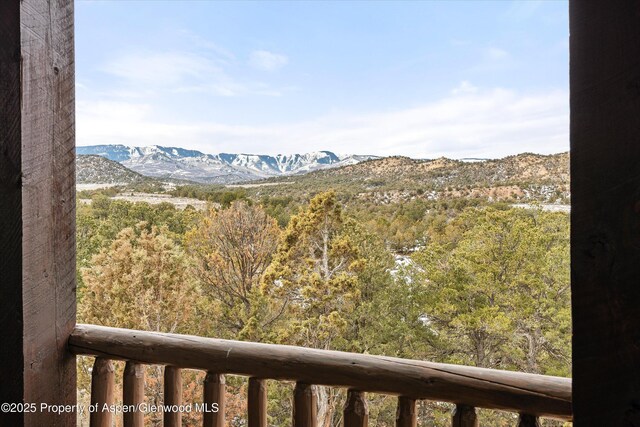 view of mountain feature featuring a wooded view