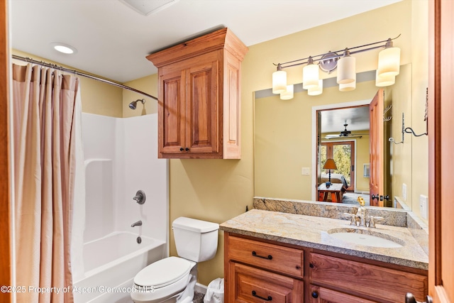 full bathroom featuring vanity, toilet, and shower / bathtub combination with curtain