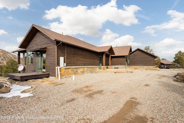 view of front of property featuring a deck