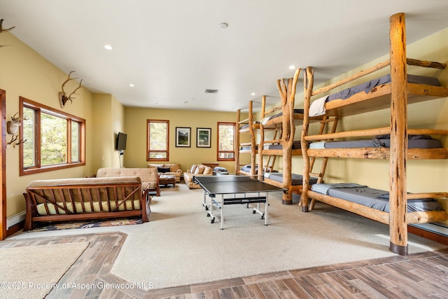 bedroom with hardwood / wood-style floors