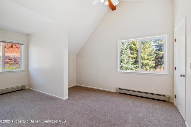 additional living space featuring plenty of natural light, baseboard heating, carpet, and vaulted ceiling