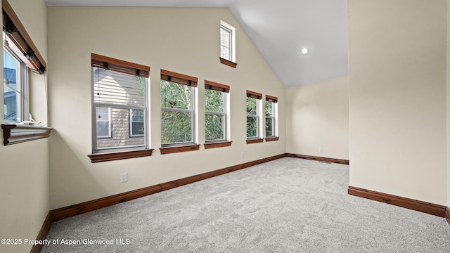 225 Juniper Ct, Basalt, CO 81621 - spare room featuring carpet floors, high vaulted ceiling, and recessed lighting