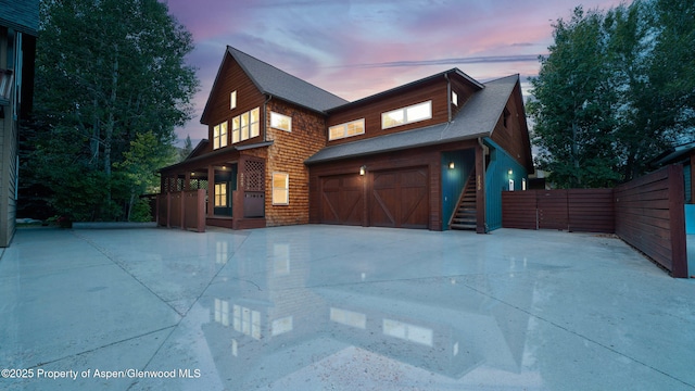 225 Juniper Ct, Basalt, CO 81621 - view of front of house with a garage, driveway, and a shingled roof