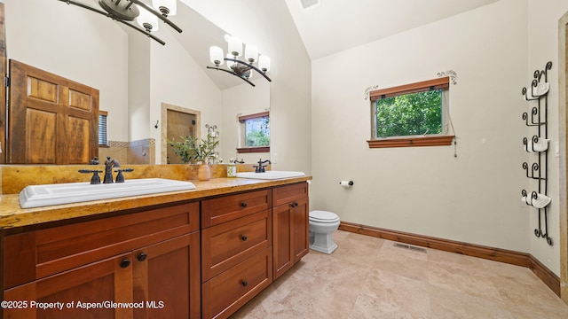 225 Juniper Ct, Basalt, CO 81621 - bathroom featuring double vanity, healthy amount of natural light, and high vaulted ceiling