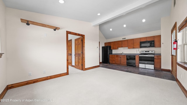 225 Juniper Ct, Basalt, CO 81621 - kitchen with black appliances, dark carpet, recessed lighting, and brown cabinets