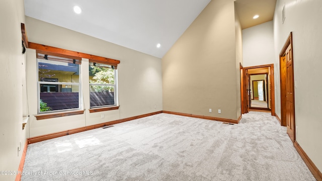 225 Juniper Ct, Basalt, CO 81621 - unfurnished room with carpet floors, high vaulted ceiling, and recessed lighting