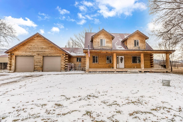 cabin featuring a garage