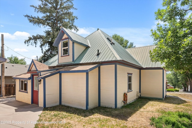 440 Whiteriver Ave, Rifle, CO 81650 - view of side of property with a metal roof