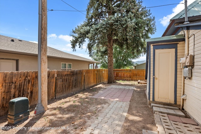 440 Whiteriver Ave, Rifle, CO 81650 - fenced backyard featuring a patio area and a storage shed