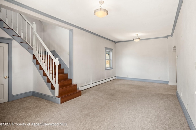 440 Whiteriver Ave, Rifle, CO 81650 - unfurnished living room with baseboard heating, carpet floors, stairway, and ornamental molding