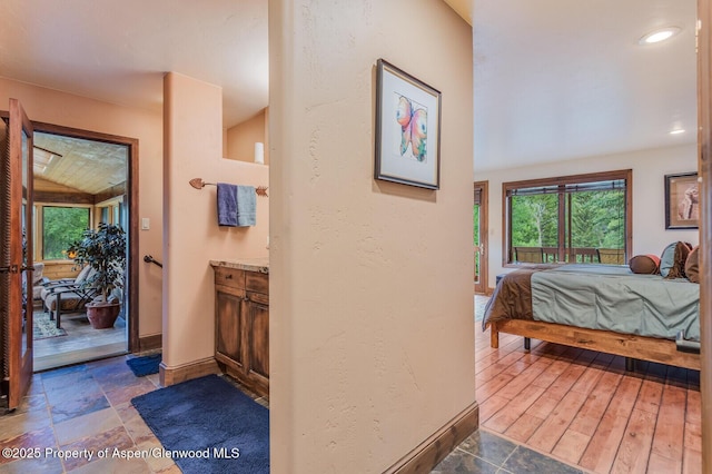 606 Dorais Way, Redstone, CO 81623 - bedroom with multiple windows and access to exterior