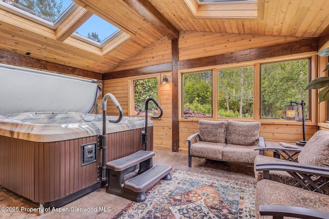 606 Dorais Way, Redstone, CO 81623 - bedroom with a skylight, vaulted ceiling, wooden walls, and wood ceiling