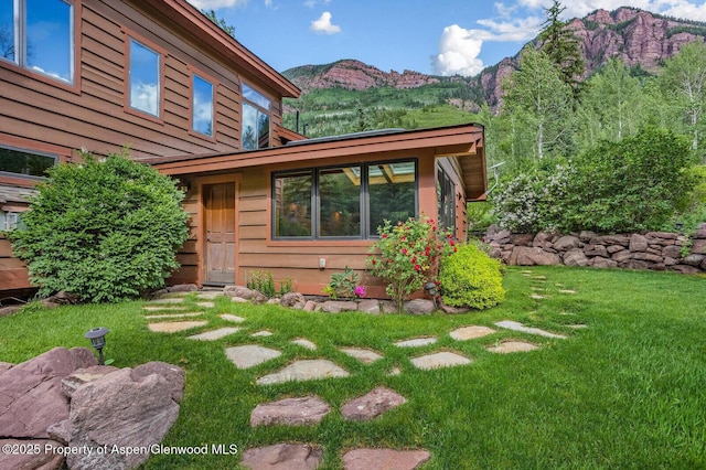 606 Dorais Way, Redstone, CO 81623 - rear view of house featuring a mountain view and a yard