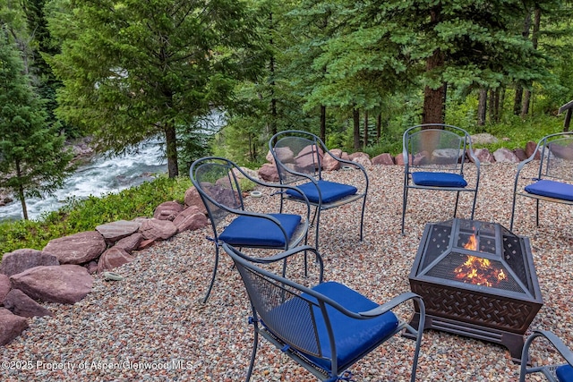606 Dorais Way, Redstone, CO 81623 - view of patio / terrace featuring an outdoor fire pit