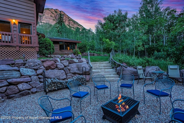 606 Dorais Way, Redstone, CO 81623 - view of yard featuring a fire pit, stairs, and a mountain view