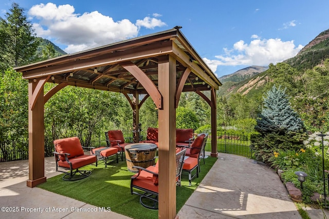606 Dorais Way, Redstone, CO 81623 - view of patio with a gazebo, a mountain view, and an outdoor fire pit