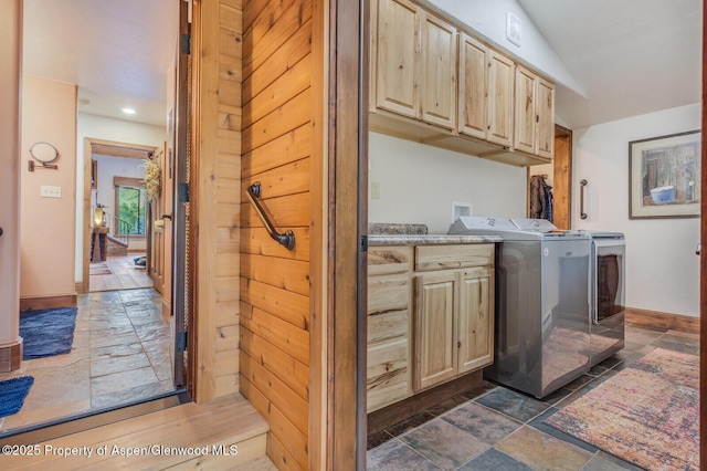606 Dorais Way, Redstone, CO 81623 - laundry area featuring cabinet space, dark stone finish floors, washer and clothes dryer, and recessed lighting