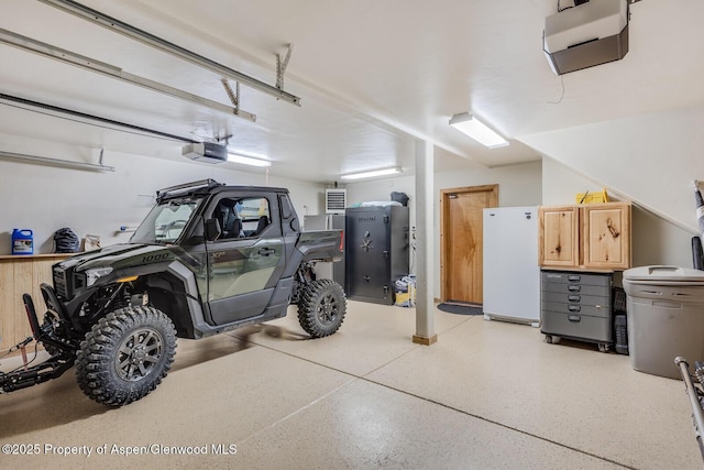 606 Dorais Way, Redstone, CO 81623 - garage featuring a garage door opener