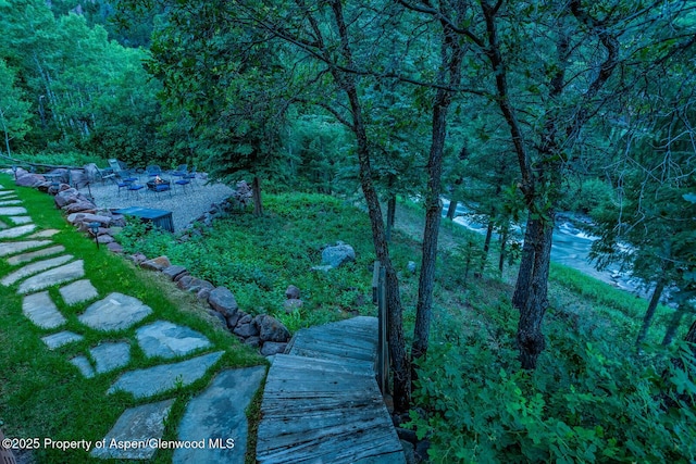 606 Dorais Way, Redstone, CO 81623 - dock with an outdoor fire pit and a forest view