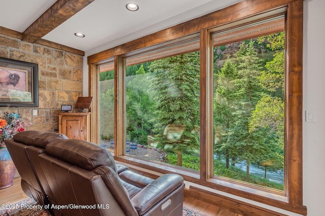 606 Dorais Way, Redstone, CO 81623 - living area featuring wood finished floors, beam ceiling, and recessed lighting