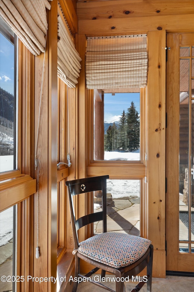dining room featuring a mountain view