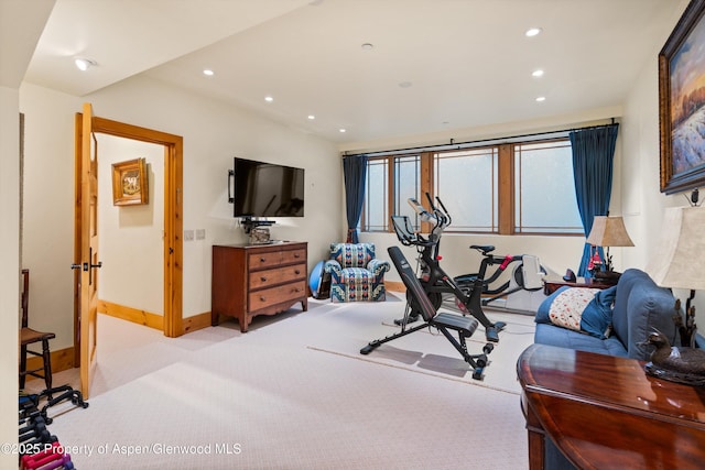 exercise room with recessed lighting, carpet flooring, and baseboards