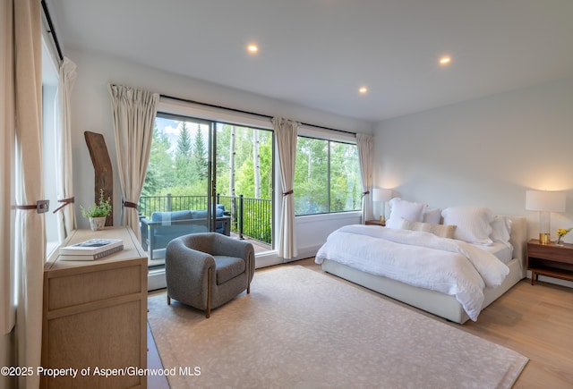 65 Harleston Grn Unit 51, Snowmass Village, CO 81615 - bedroom featuring recessed lighting, access to outside, and light wood-style flooring