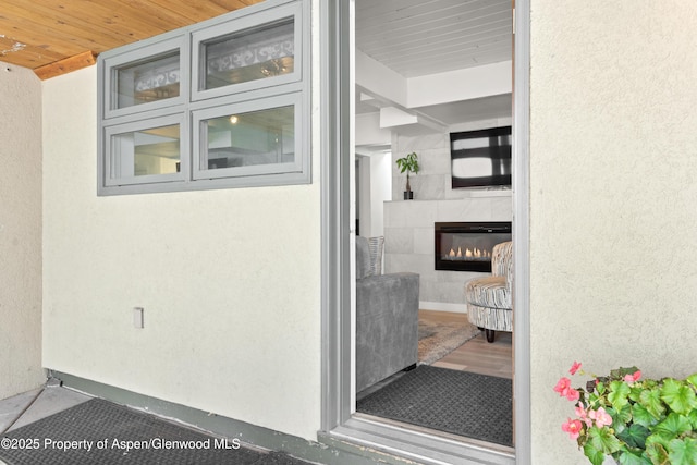 630 E Cooper Ave Unit 4, Aspen, CO 81611 - view of exterior entry with a fireplace