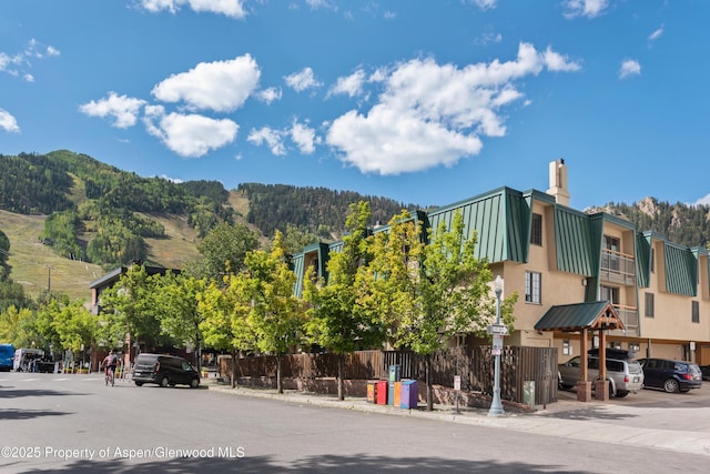 630 E Cooper Ave Unit 4, Aspen, CO 81611 - view of building exterior featuring a mountain view