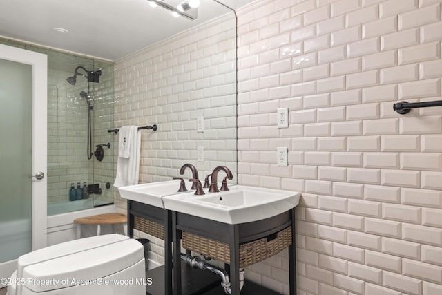 630 E Cooper Ave Unit 4, Aspen, CO 81611 - bathroom with tiled shower / bath, vanity, tile walls, toilet, and ornamental molding