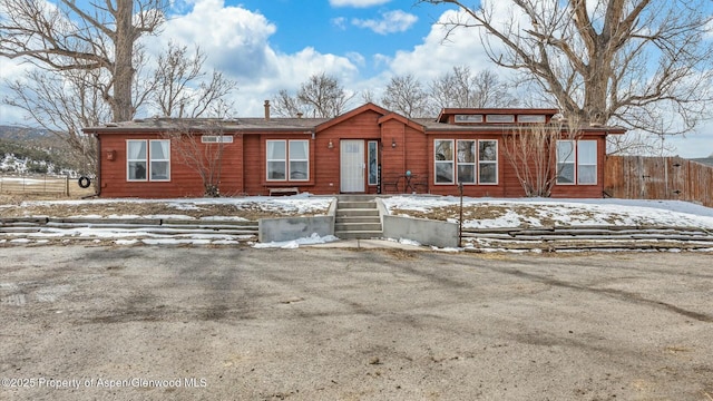 chalet / cabin with fence