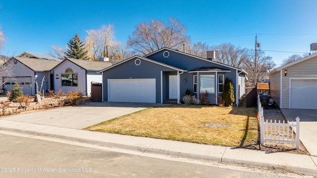 ranch-style house featuring driveway, an attached garage, a front lawn, and fence