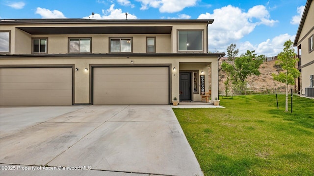 137 Willow Cir, Rifle, CO 81650 - view of front of property featuring stucco siding, driveway, an attached garage, and cooling unit