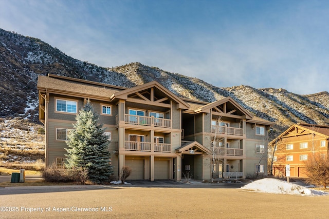 612 River View Dr Unit 804, New Castle, CO 81647 - view of property featuring a mountain view and a garage