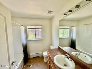 612 River View Dr Unit 804, New Castle, CO 81647 - bathroom featuring a baseboard radiator, vanity, and shower / tub combo