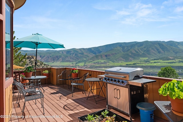1789 Medicine Bow Rd, Aspen, CO 81611 - wooden terrace with a mountain view