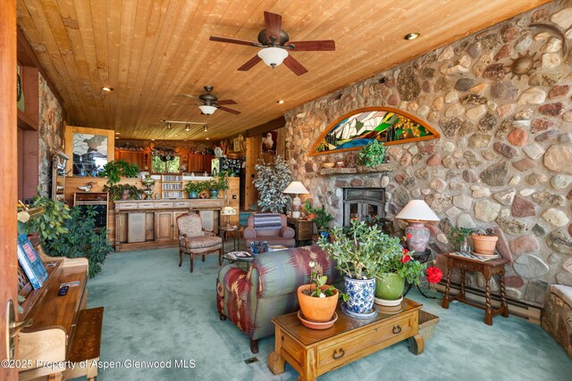 1789 Medicine Bow Rd, Aspen, CO 81611 - living area featuring carpet flooring, wood ceiling, and ceiling fan