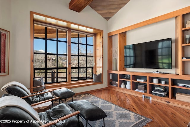 172 Deer Ridge Ln, Snowmass Village, CO 81615 - living room with lofted ceiling and hardwood / wood-style floors