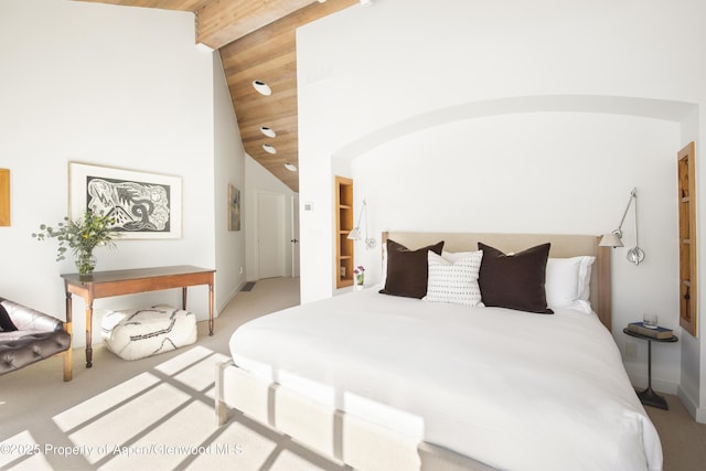 172 Deer Ridge Ln, Snowmass Village, CO 81615 - bedroom with baseboards, light carpet, wood ceiling, and high vaulted ceiling