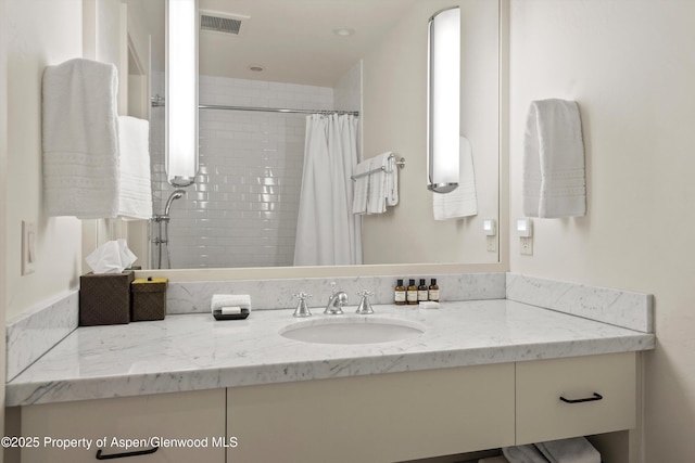 172 Deer Ridge Ln, Snowmass Village, CO 81615 - bathroom with vanity and a tile shower