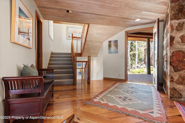 172 Deer Ridge Ln, Snowmass Village, CO 81615 - entrance foyer with wood ceiling, wood-type flooring, vaulted ceiling, and stairs