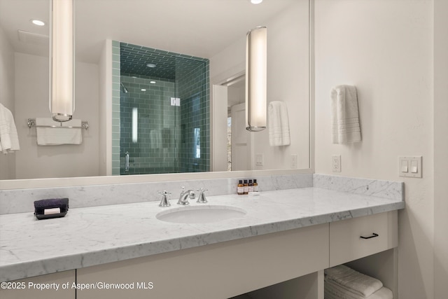172 Deer Ridge Ln, Snowmass Village, CO 81615 - bathroom with vanity, a shower stall, and recessed lighting