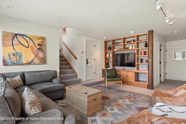 172 Deer Ridge Ln, Snowmass Village, CO 81615 - living area with stairway, recessed lighting, rail lighting, light carpet, and baseboards