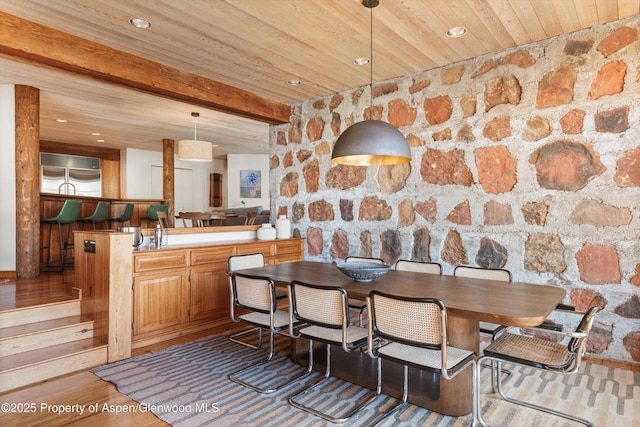 172 Deer Ridge Ln, Snowmass Village, CO 81615 - dining area with wood ceiling with exposed beams, recessed lighting, and wood finished floors