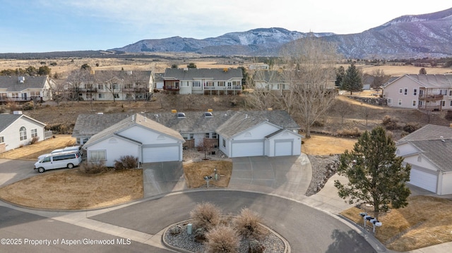 aerial view featuring a mountain view