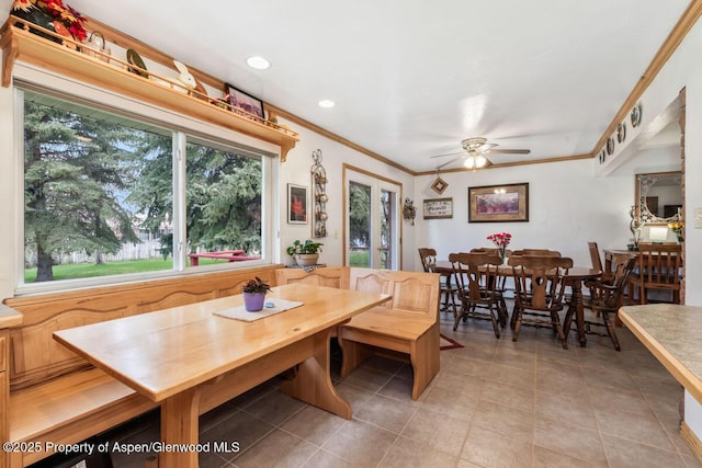 dining space with light tile patterned floors, ornamental molding, a ceiling fan, and recessed lighting