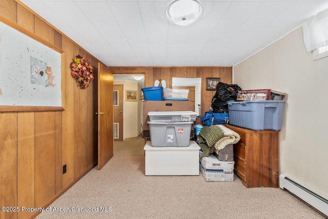 storage room with visible vents and a baseboard radiator