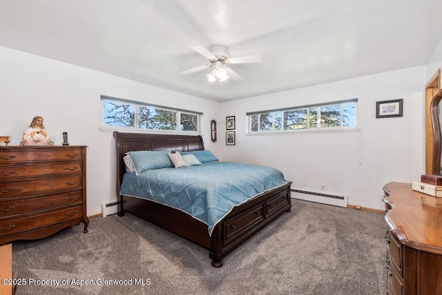 carpeted bedroom with baseboards, a baseboard radiator, and multiple windows